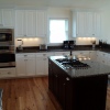 White Thermofoil w/Stained Island - Built for Christi Construction