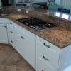 White Thermofoil with Granite Countertops - Built for Mancuso Development